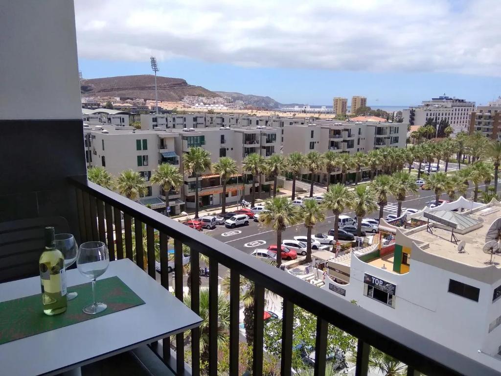 a balcony with a view of a parking lot at Modern Studio with Sea View in Arona 40 m² with Balcony in Arona
