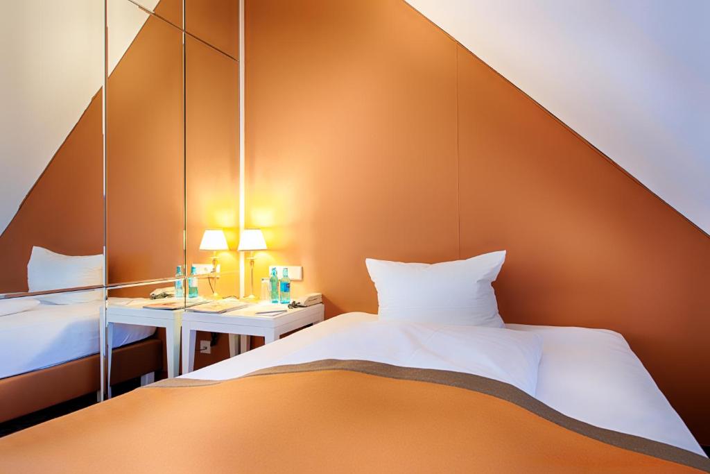 Postel nebo postele na pokoji v ubytování Hotel SchreiberHof