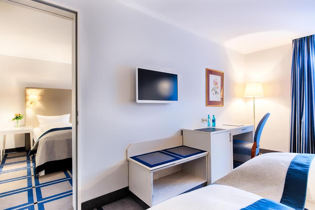 Postel nebo postele na pokoji v ubytování Hotel SchreiberHof