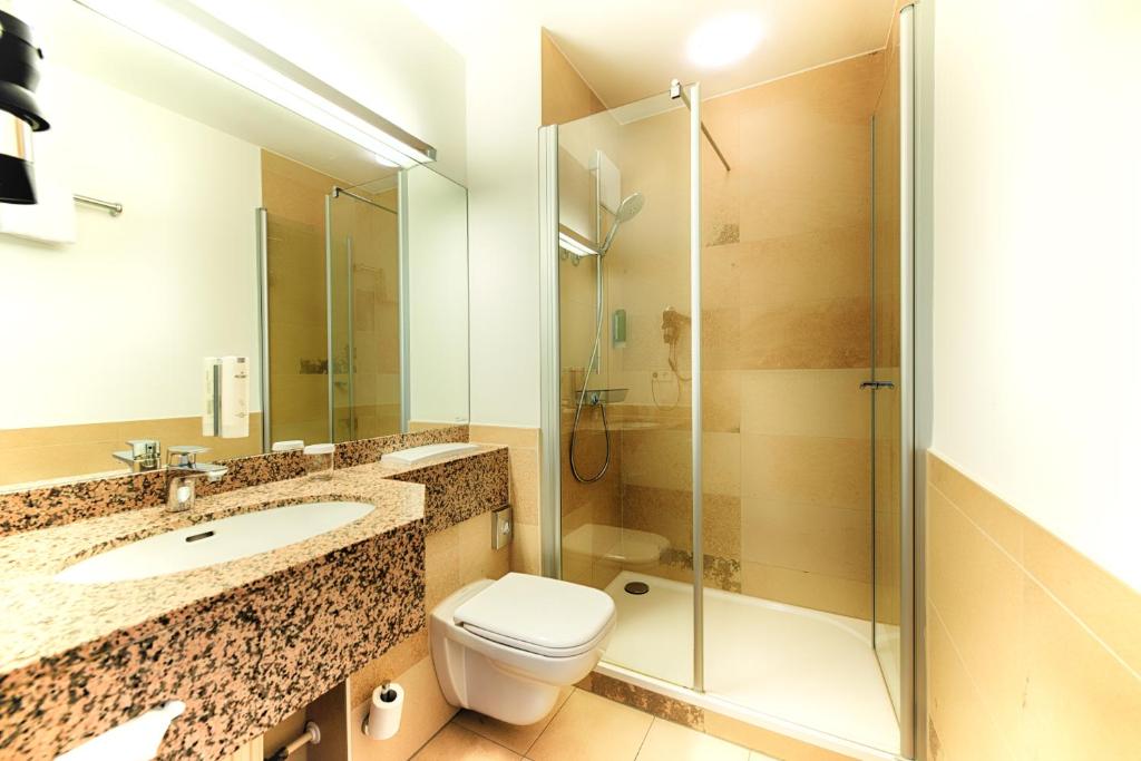 Koupelna v ubytování Hotel SchreiberHof