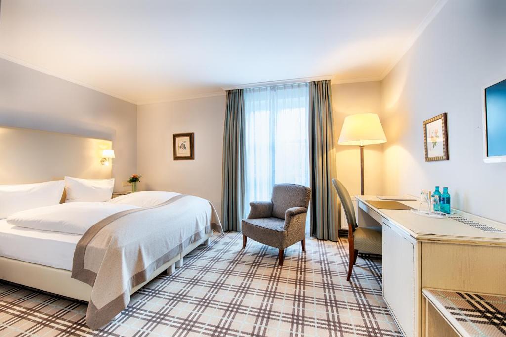 Postel nebo postele na pokoji v ubytování Hotel SchreiberHof