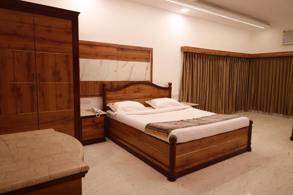 Postel nebo postele na pokoji v ubytování Hotel Sunpark - A Luxury Hotel