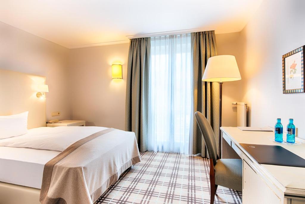 Postel nebo postele na pokoji v ubytování Hotel SchreiberHof