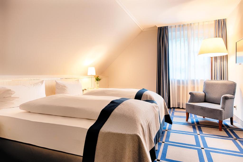Postel nebo postele na pokoji v ubytování Hotel SchreiberHof