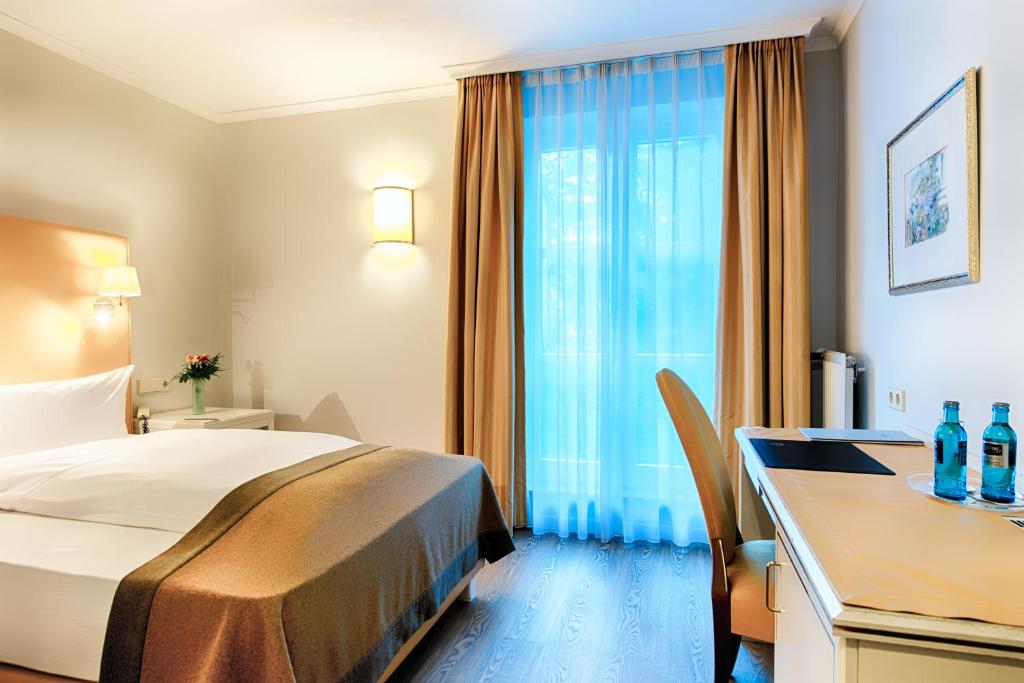 Postel nebo postele na pokoji v ubytování Hotel SchreiberHof