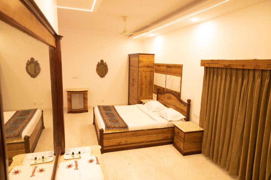 Postel nebo postele na pokoji v ubytování Hotel Sunpark - A Luxury Hotel