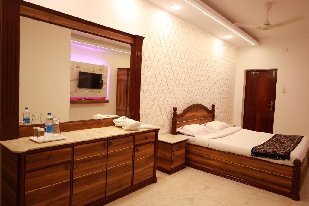 Postel nebo postele na pokoji v ubytování Hotel Sunpark - A Luxury Hotel