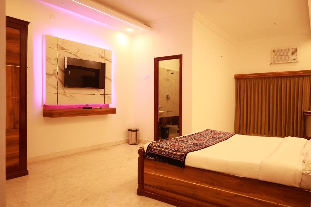 Postel nebo postele na pokoji v ubytování Hotel Sunpark - A Luxury Hotel