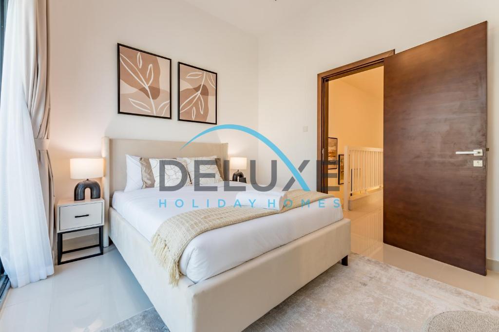 Voodi või voodid majutusasutuse Special Rate with Temp Controlled Pool, BBQ & Maid's by Deluxe Holiday Homes toas