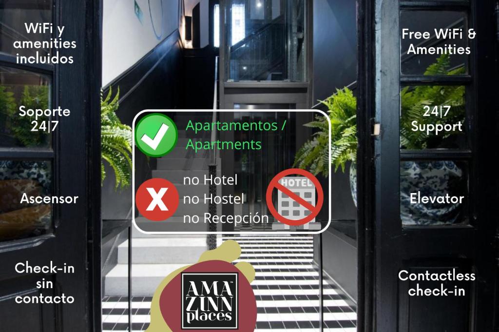 un montón de señales en el lado de un edificio en Amor de Dios 17 Boutique Apartments, en Madrid