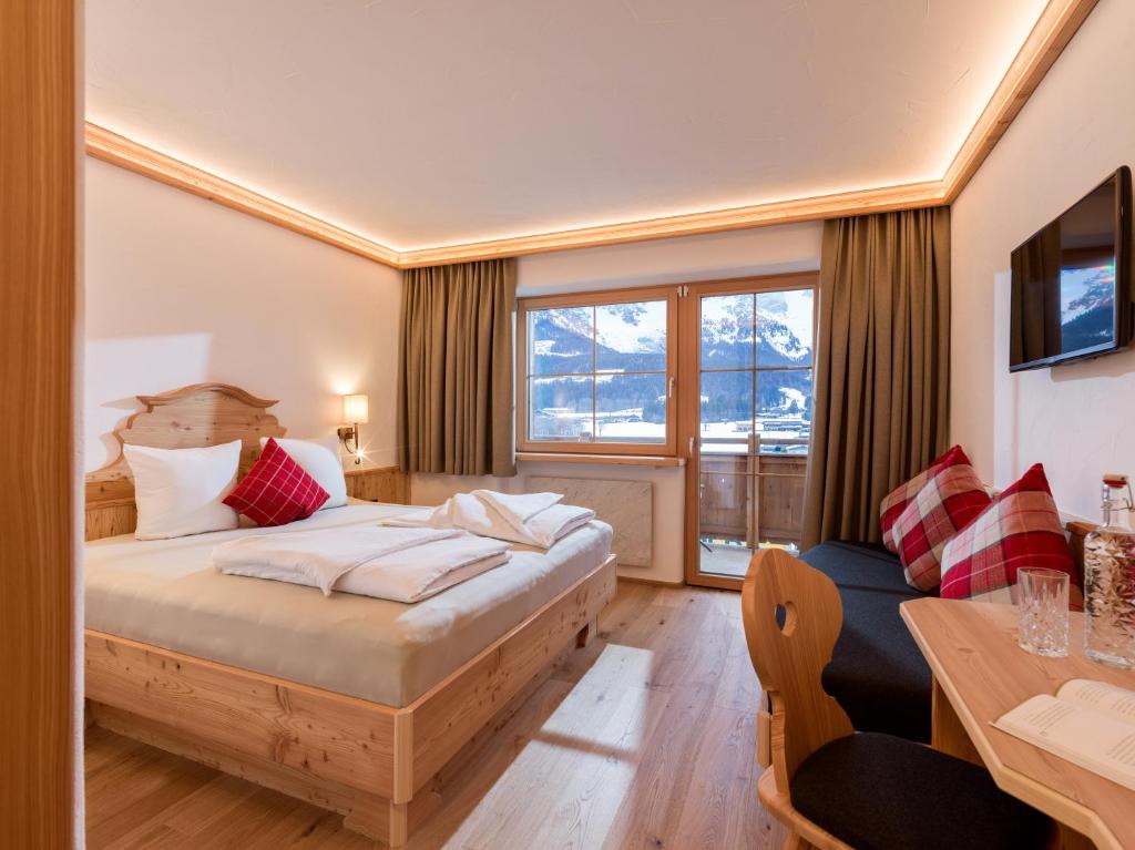 Postelja oz. postelje v sobi nastanitve Hotel Ritterhof Ellmau