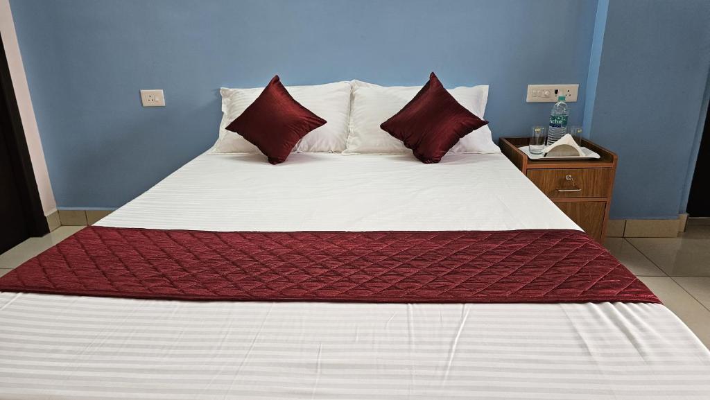 Postel nebo postele na pokoji v ubytování Pondy Pleasant Stay