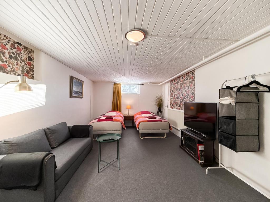 Postel nebo postele na pokoji v ubytování Lantligt gästrum med gratis wifi & bastu