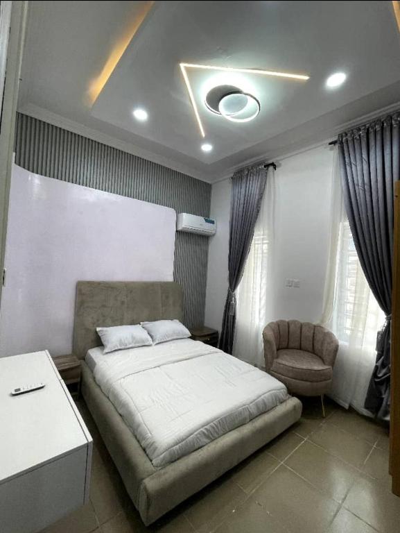 Postel nebo postele na pokoji v ubytování De-Luxe Haven Apartment