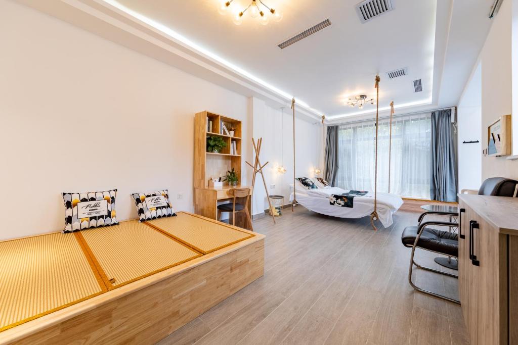 Ein Bett oder Betten in einem Zimmer der Unterkunft Mutianyu Great Wall Jingshan First House Boutique B&B
