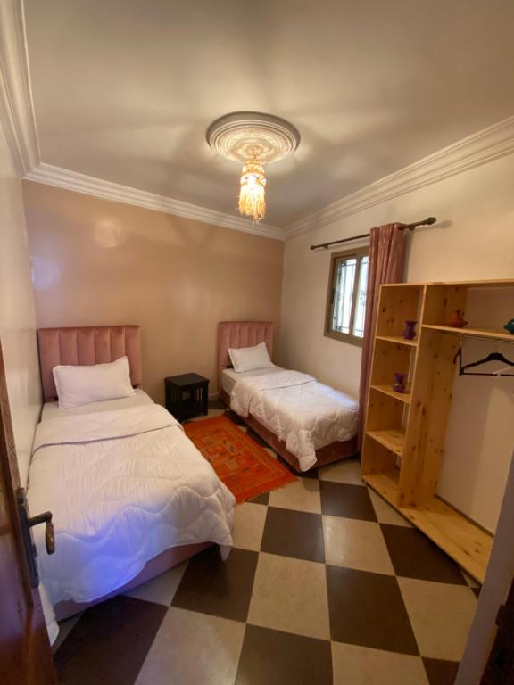 Postel nebo postele na pokoji v ubytování Mira Guest House