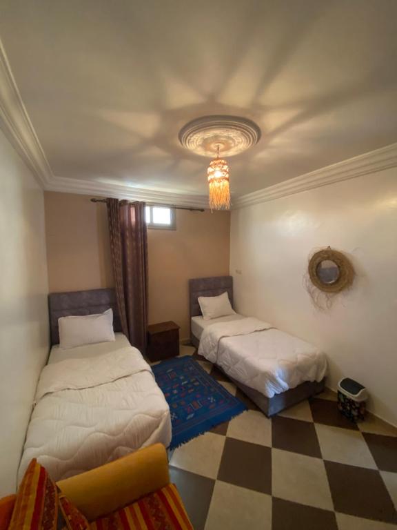 Postel nebo postele na pokoji v ubytování Mira Guest House