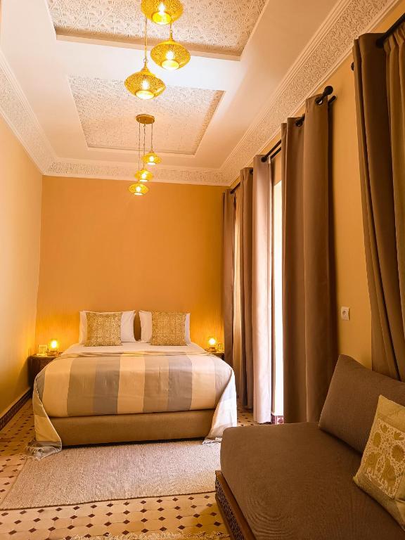 Postel nebo postele na pokoji v ubytování Riad Jalina