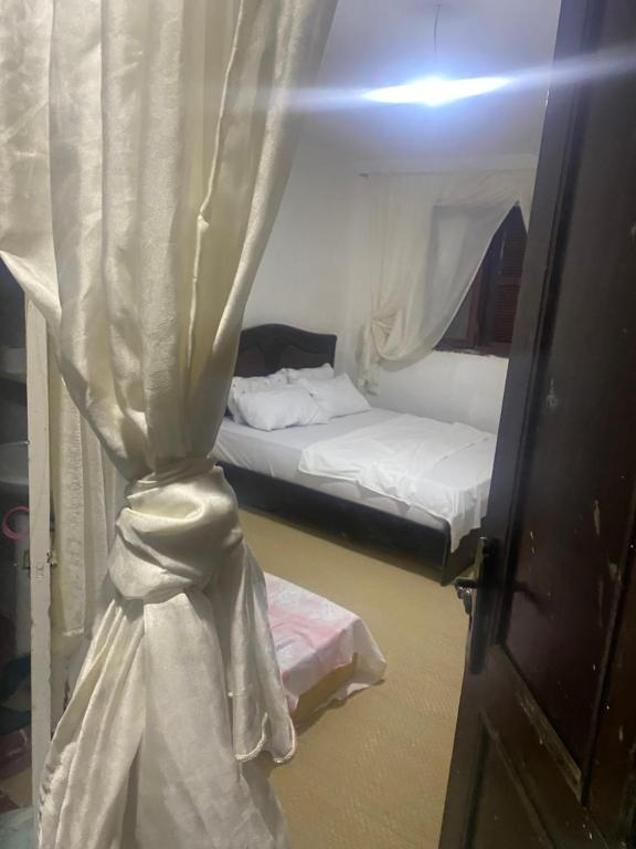 Postel nebo postele na pokoji v ubytování Maison d'hotes oued el Makhazine chez Bilal