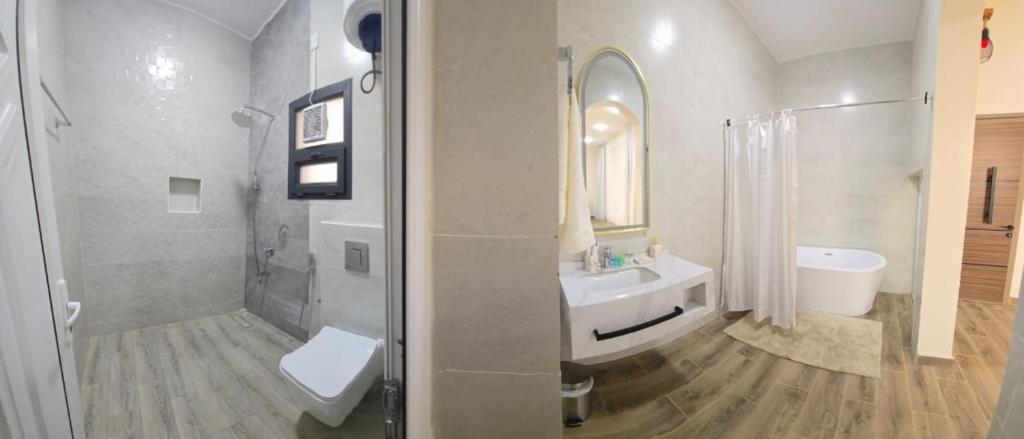 Koupelna v ubytování Roghan Hospitality Inn
