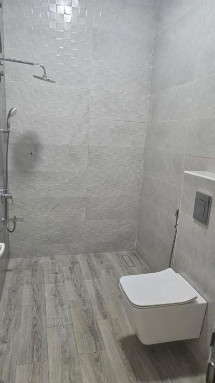 Koupelna v ubytování Roghan Hospitality Inn