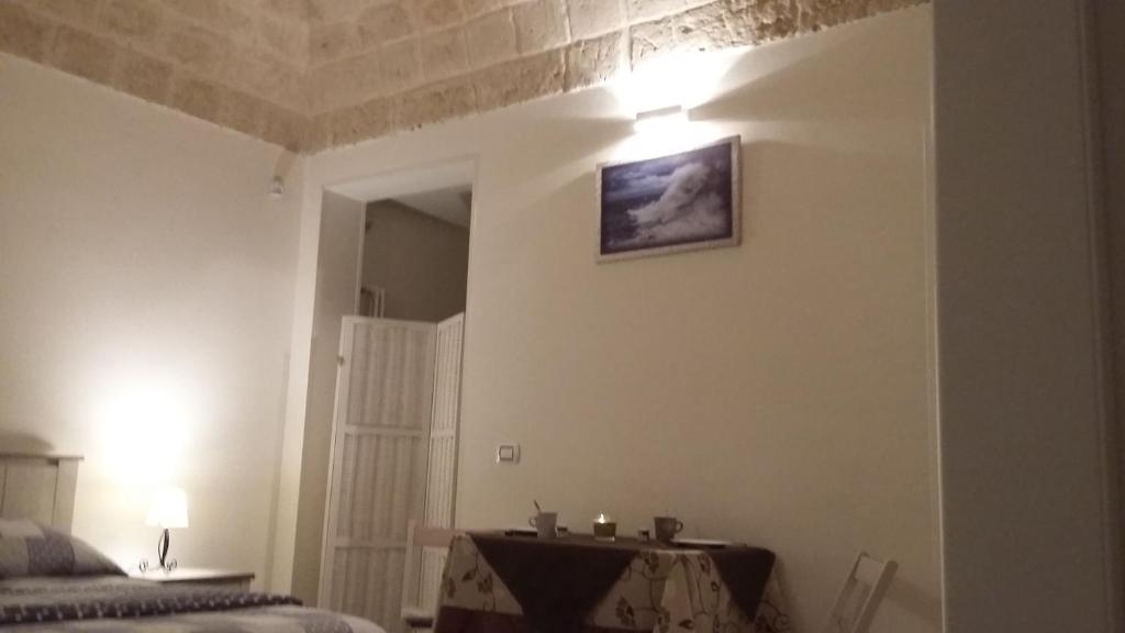 Postel nebo postele na pokoji v ubytování Dimora Dei Gelsi