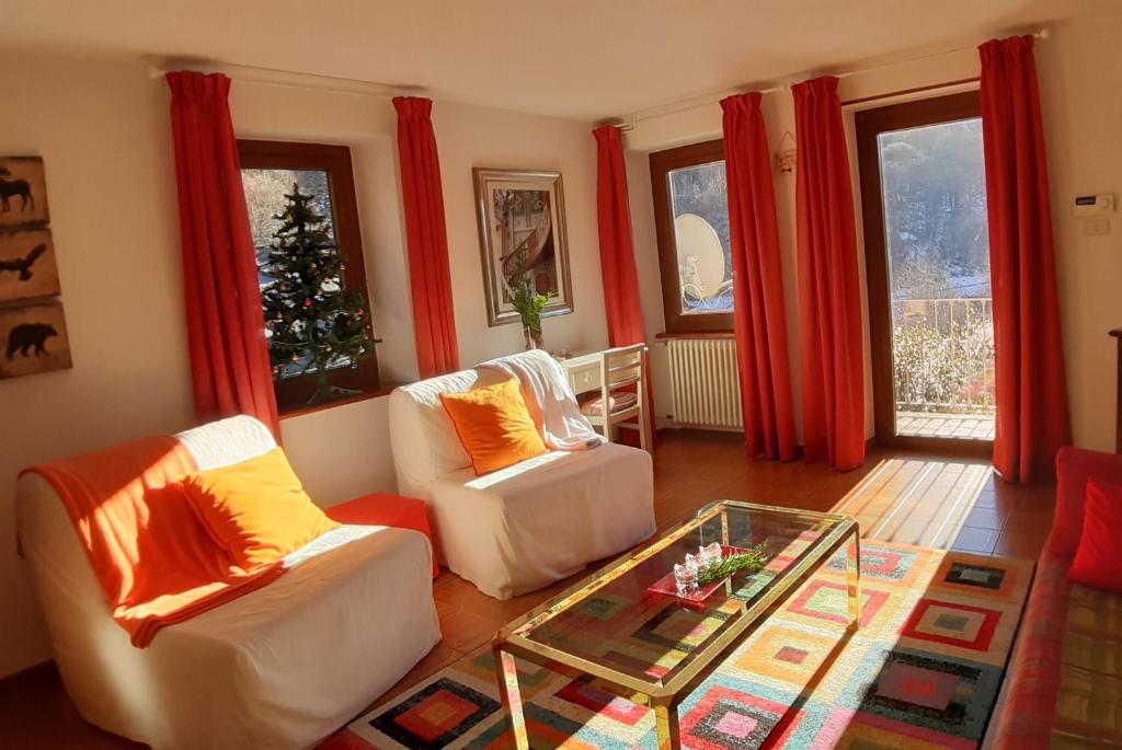 a living room with two couches and a coffee table at Issime - da Carla (CIR n. 0001) in Issime
