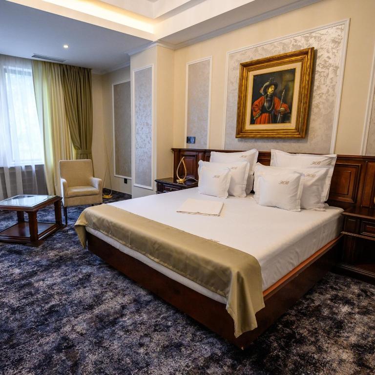 Postel nebo postele na pokoji v ubytování Hotel Bulevard