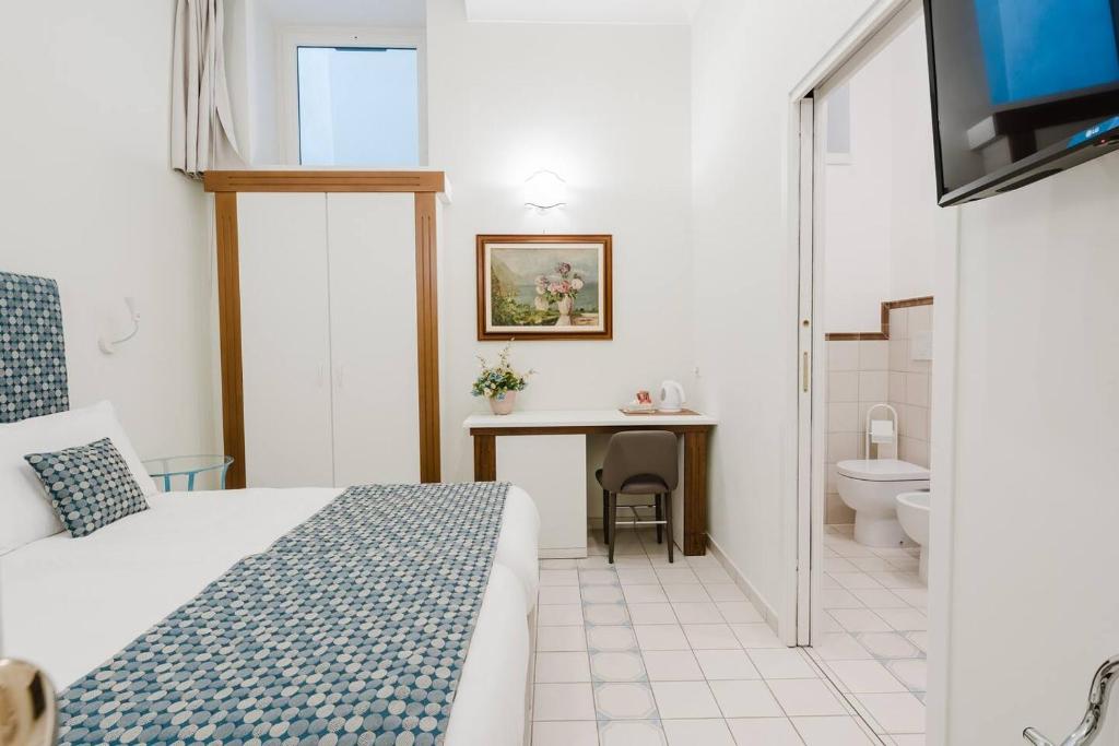 Postel nebo postele na pokoji v ubytování Rosa Magra Guest House