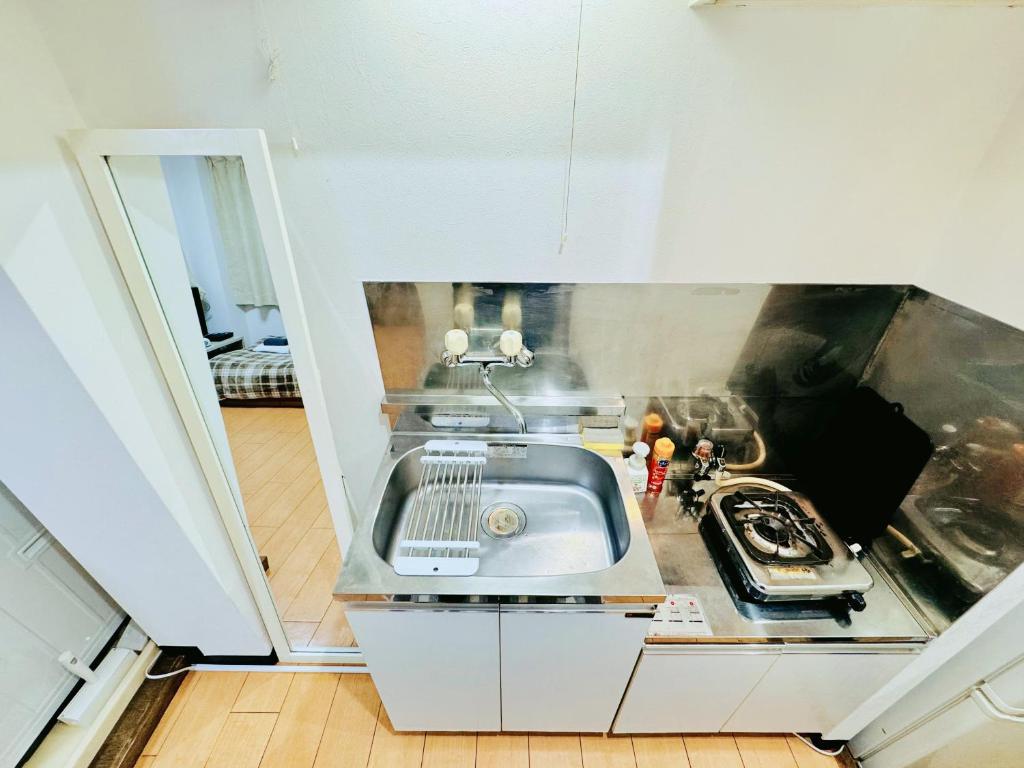 Kuchyň nebo kuchyňský kout v ubytování Kawaguchi house