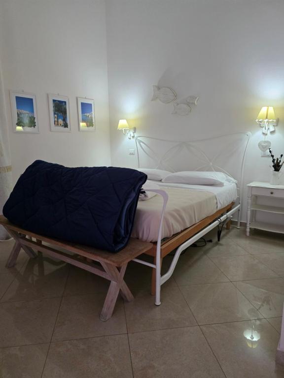 Postel nebo postele na pokoji v ubytování White Suite Polignano 08