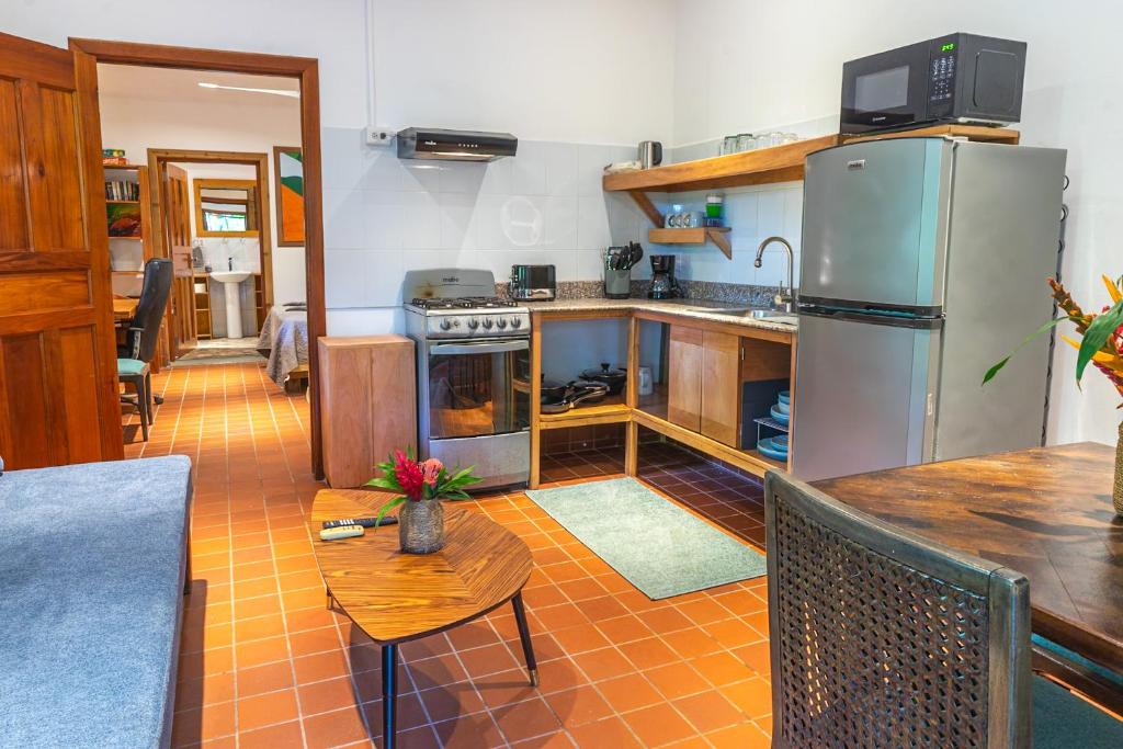Kuchyň nebo kuchyňský kout v ubytování TropicalArts Resort&Studios