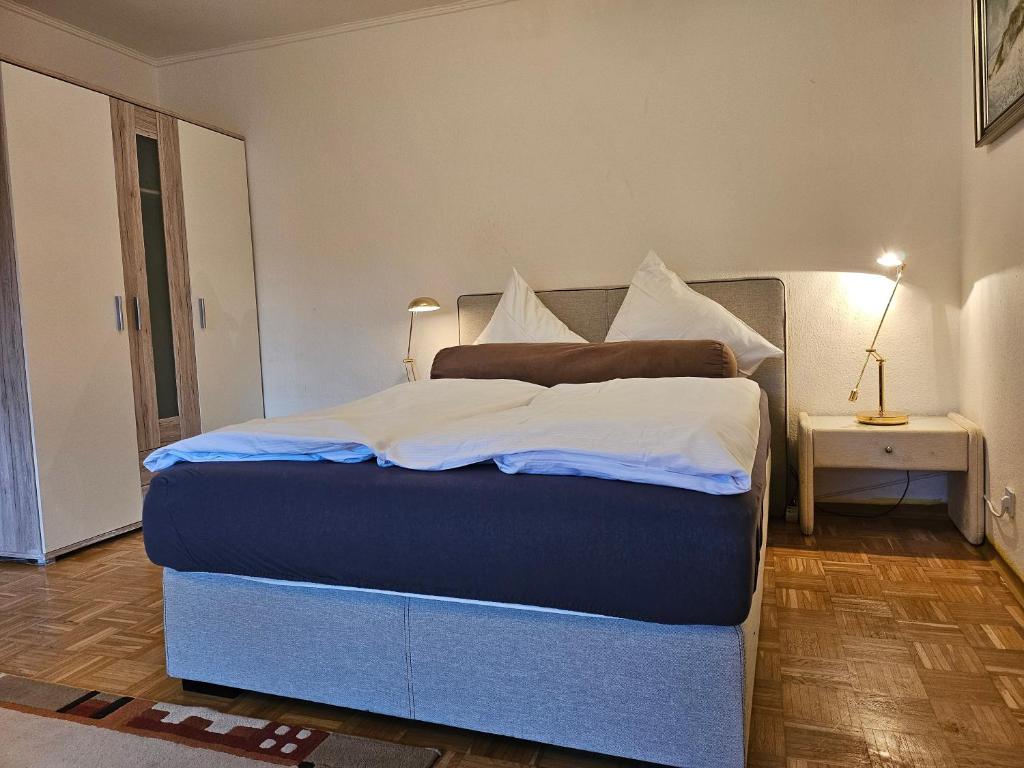 Ένα ή περισσότερα κρεβάτια σε δωμάτιο στο Ferienwohnung Große Bergluft Hahnenklee