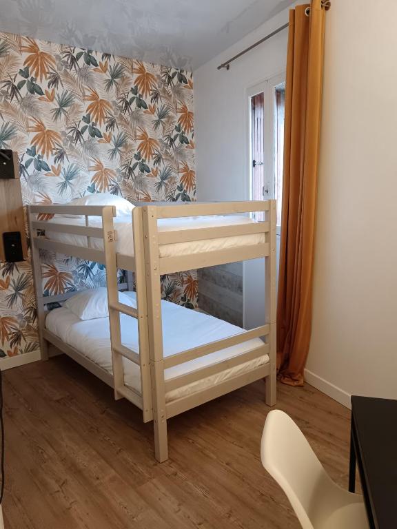Postel nebo postele na pokoji v ubytování O'Cub Hotel