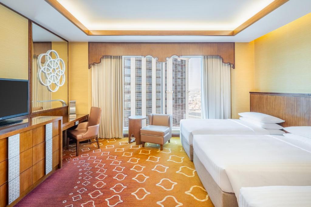 Rúm í herbergi á Jabal Omar Marriott Hotel Makkah