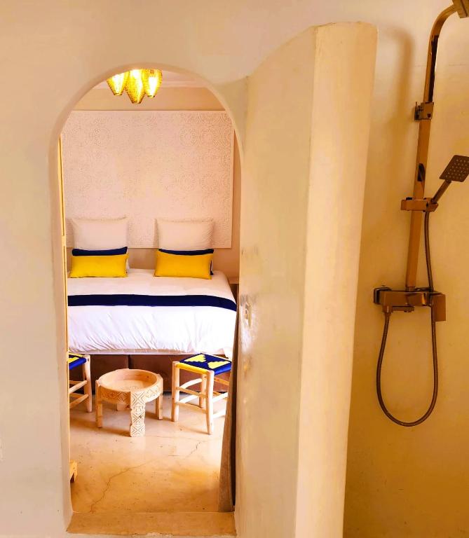 Postel nebo postele na pokoji v ubytování Riad Vilamoura & SPA