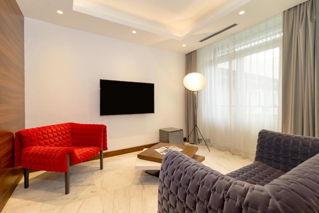 TV a/nebo společenská místnost v ubytování Hotel San Felipe