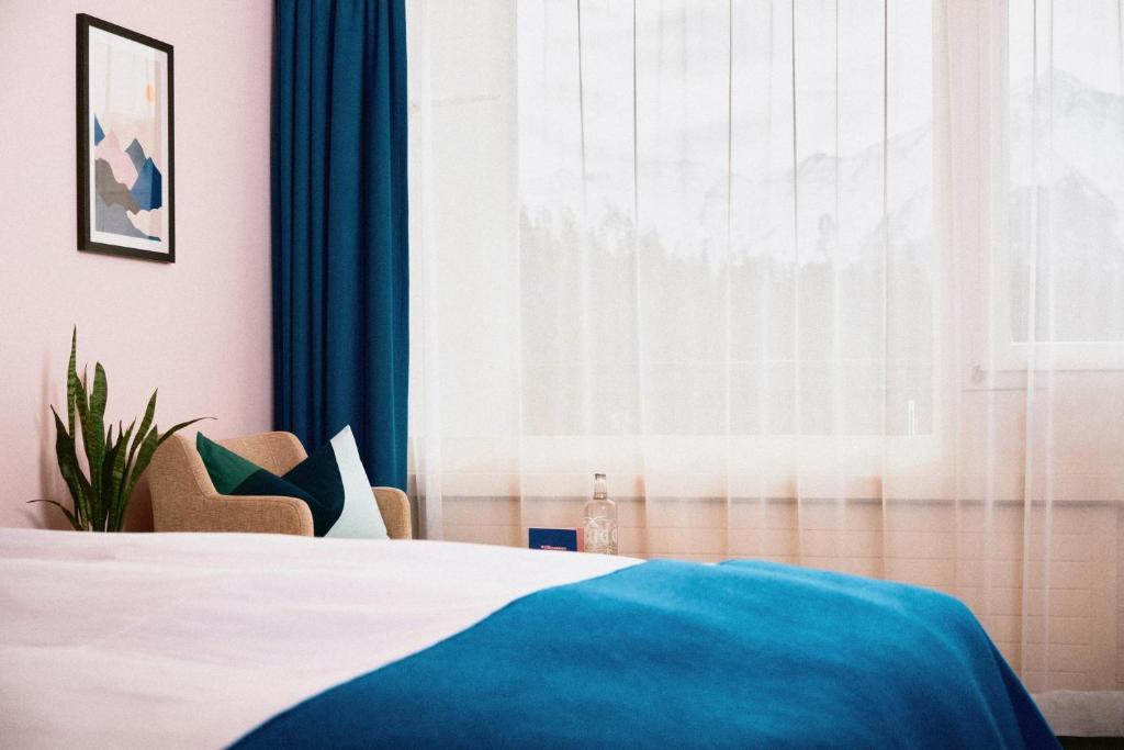 Postel nebo postele na pokoji v ubytování signinahotel