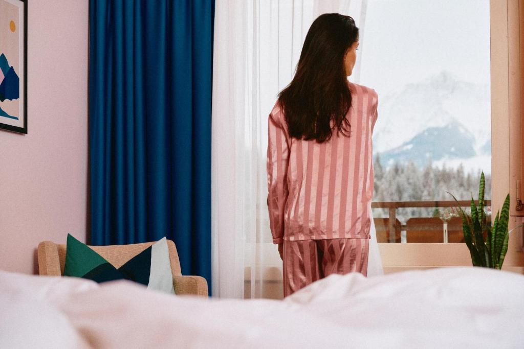 Postel nebo postele na pokoji v ubytování signinahotel