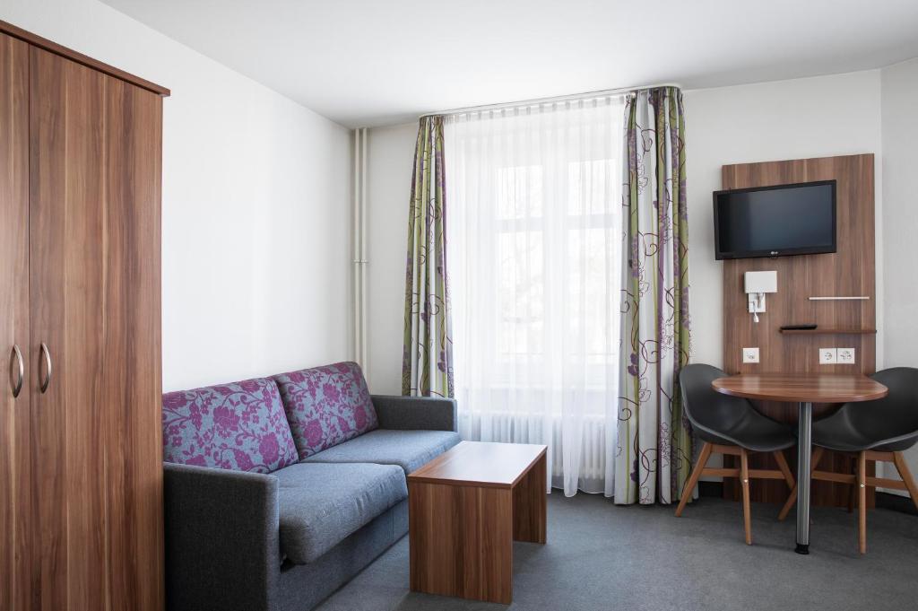 TV a/nebo společenská místnost v ubytování Hotel Resslirytti
