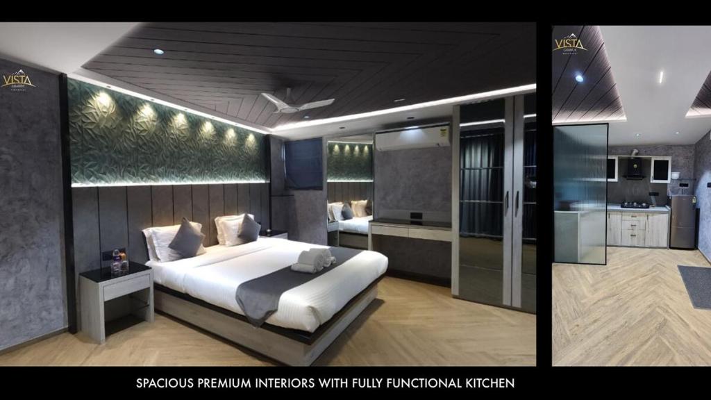 a bedroom with a large bed and a kitchen at Studio Apartment by Vista Grande in Panchgani