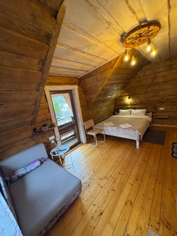 Postel nebo postele na pokoji v ubytování Садиба Сімейний Затишок