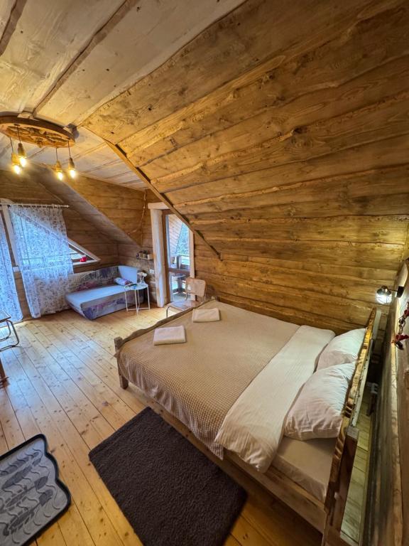 Postel nebo postele na pokoji v ubytování Садиба Сімейний Затишок