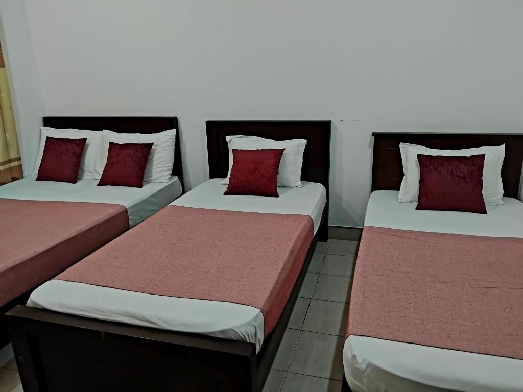 Postel nebo postele na pokoji v ubytování Paradise Residence Hanthana