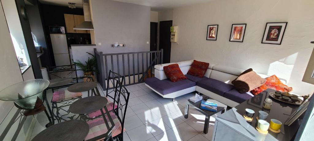 Zona d'estar a Maison Comet