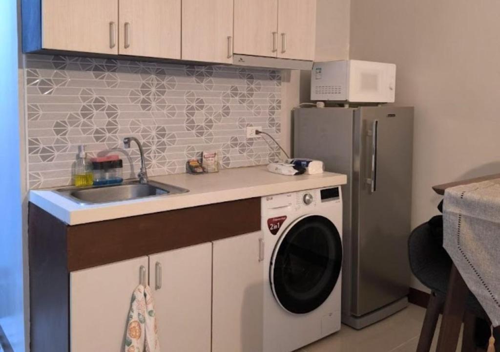 Kuchyň nebo kuchyňský kout v ubytování Shiloh Suites at Saekyung 956