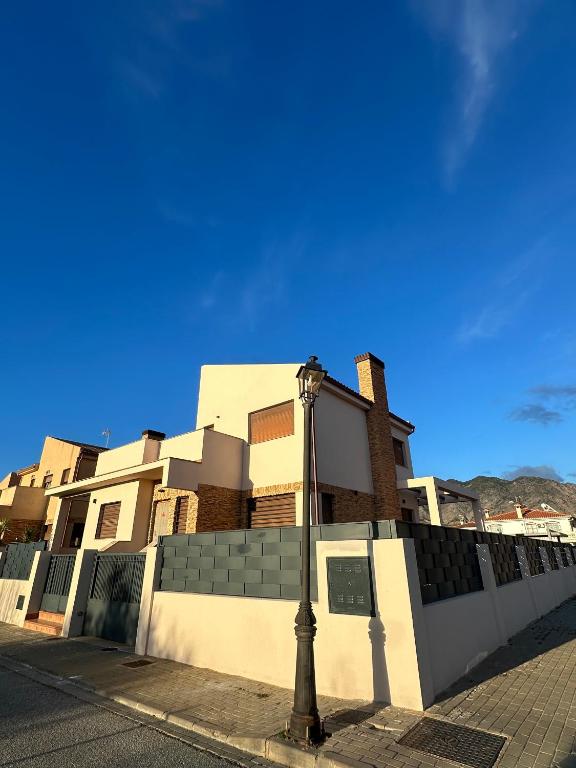 a street light in front of a building at VillaLuxury in Dúrcal