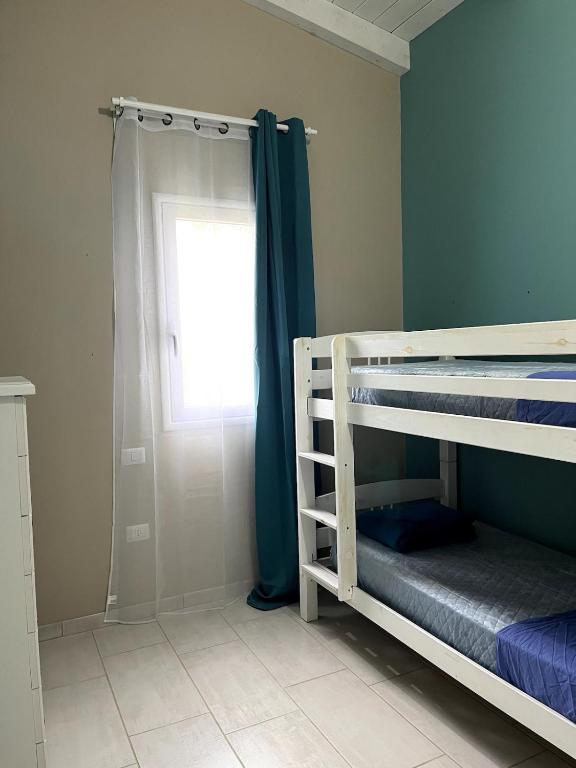 VILLA AUREA Apartment in Castiadas客房内的一张或多张床位
