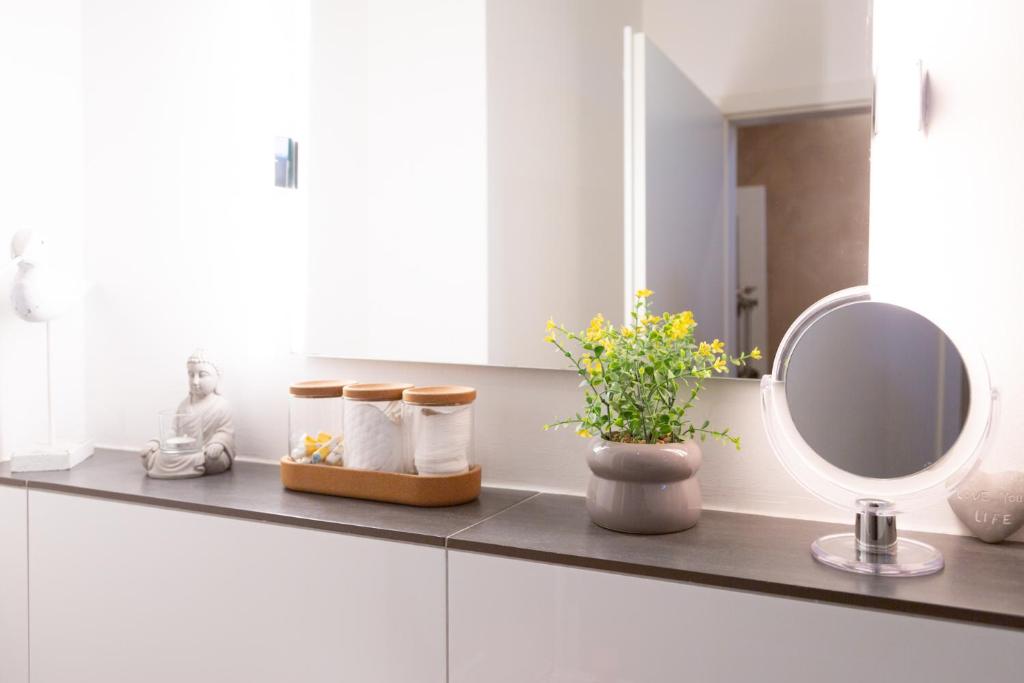 MiCasa OL - Deluxe Apartment mit Stil - Carport Stellplatz - Küche - WLAN - 3,7 KW Steckdose für E Auto - Terrasse - 18