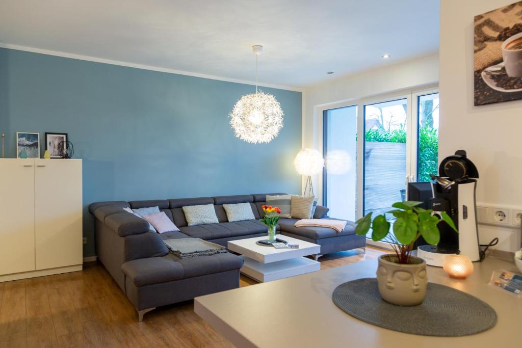 MiCasa OL - Deluxe Apartment mit Stil - Carport Stellplatz - Küche - WLAN - 3,7 KW Steckdose für E Auto - Terrasse - 10